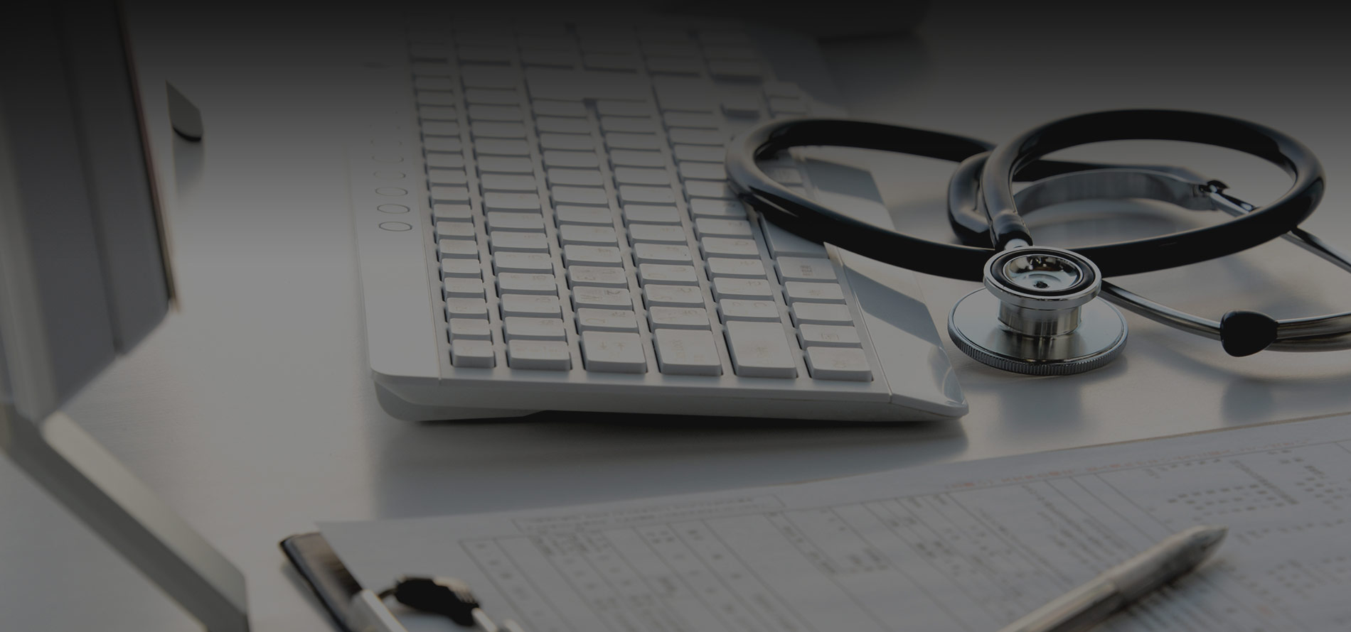 a keyboard and stethoscope in a medical office